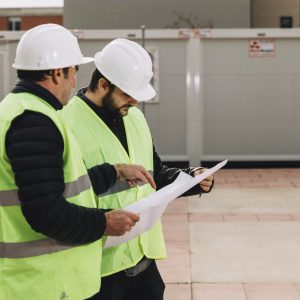 builders-discussing-drafts (1)